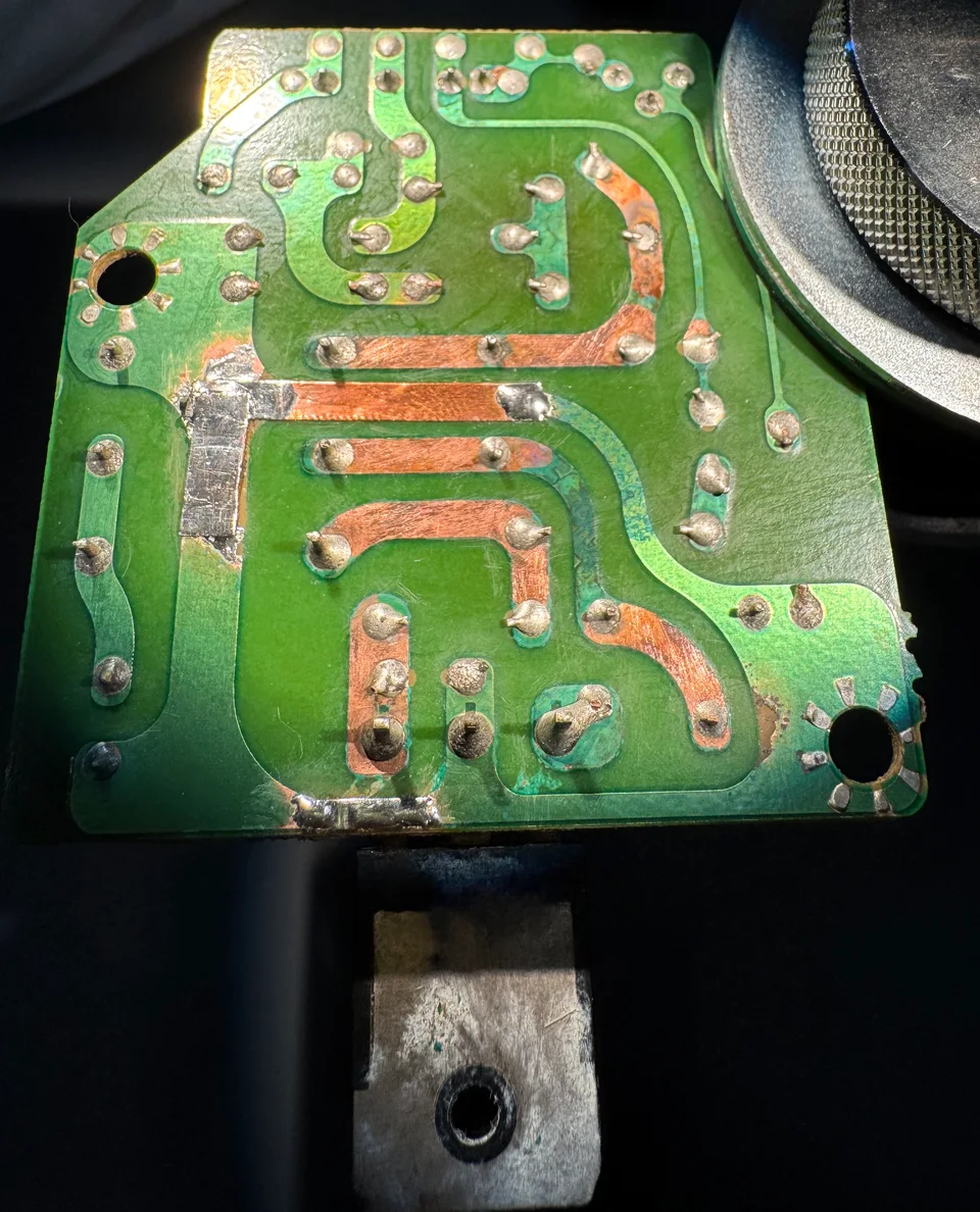 The humidifier PCB after cleaning, with exposed copper traces visible.